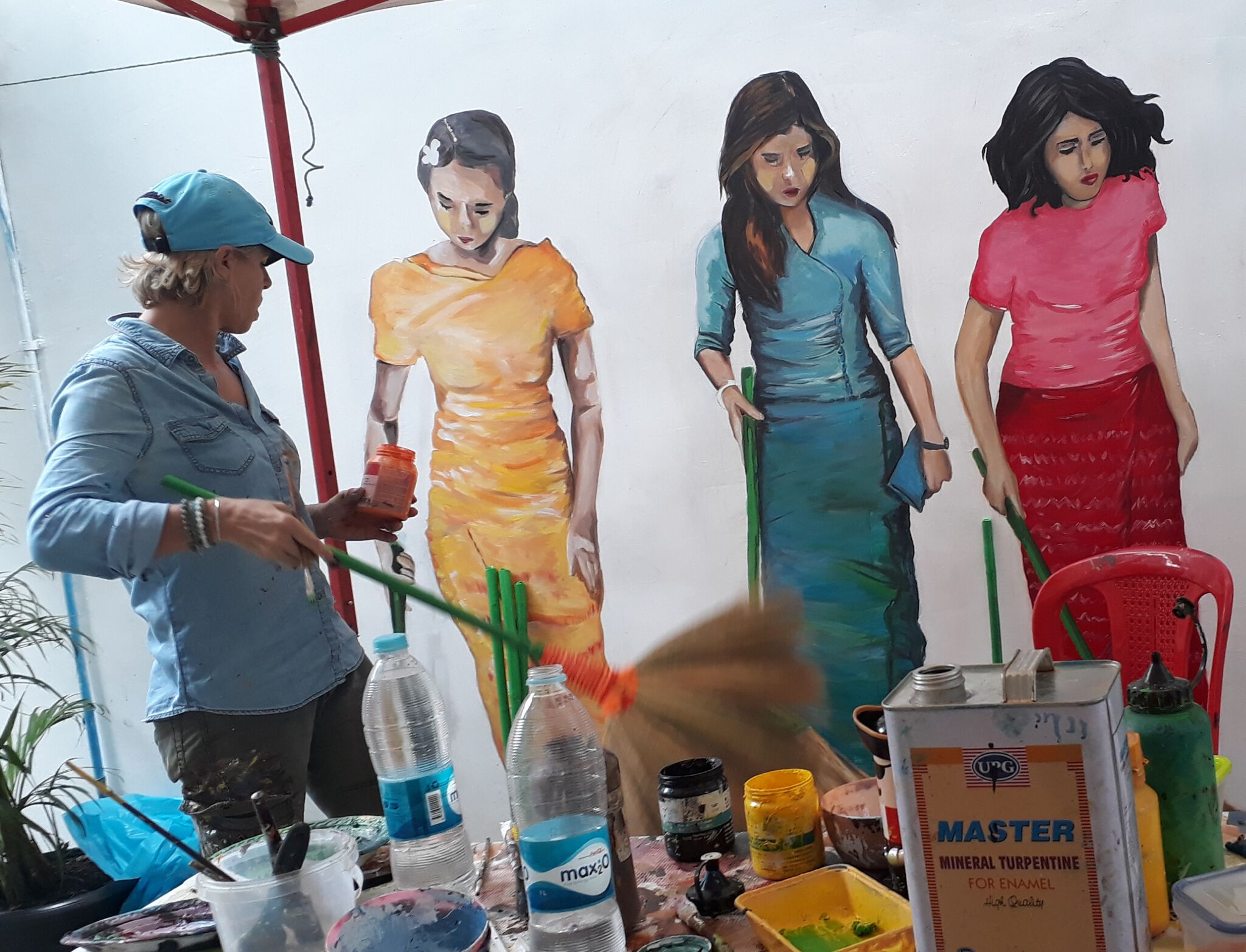 Delphine de Lorme&mdash;6 burmese with a broom