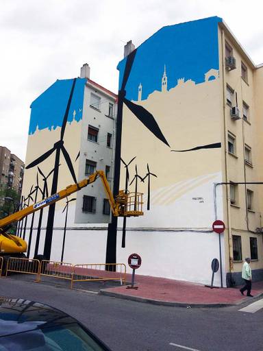 DON QUIJOTE CARGANDO CONTRA LOS MOLINOS