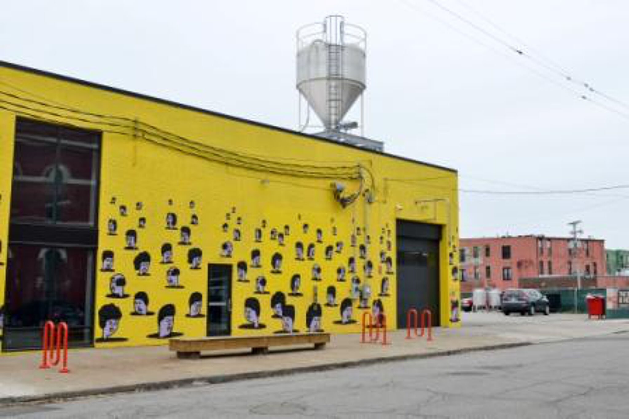 Joe Lanzilotta&mdash;heads floating on a yellow wall