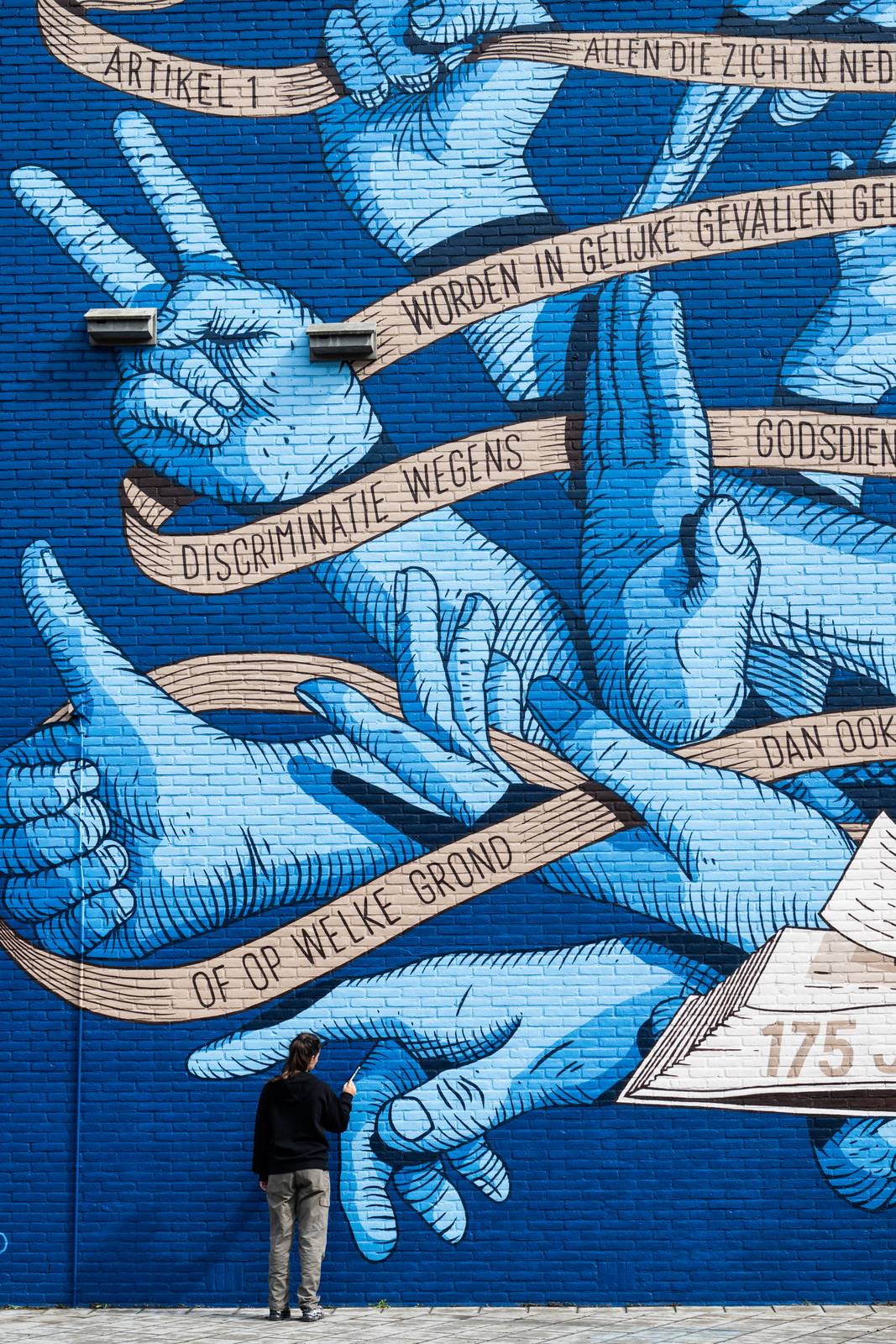 De-strakke-hand&mdash;Article 1.